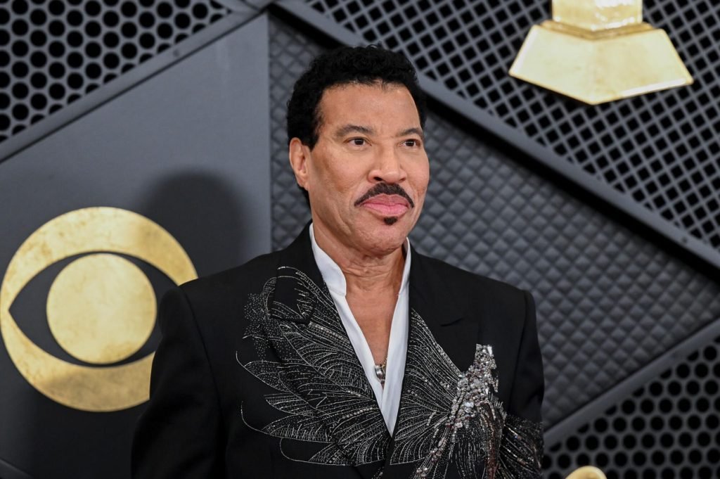 Damn Unk! Chris Brown Reacts After Lionel Richie Roasts Him During Concert